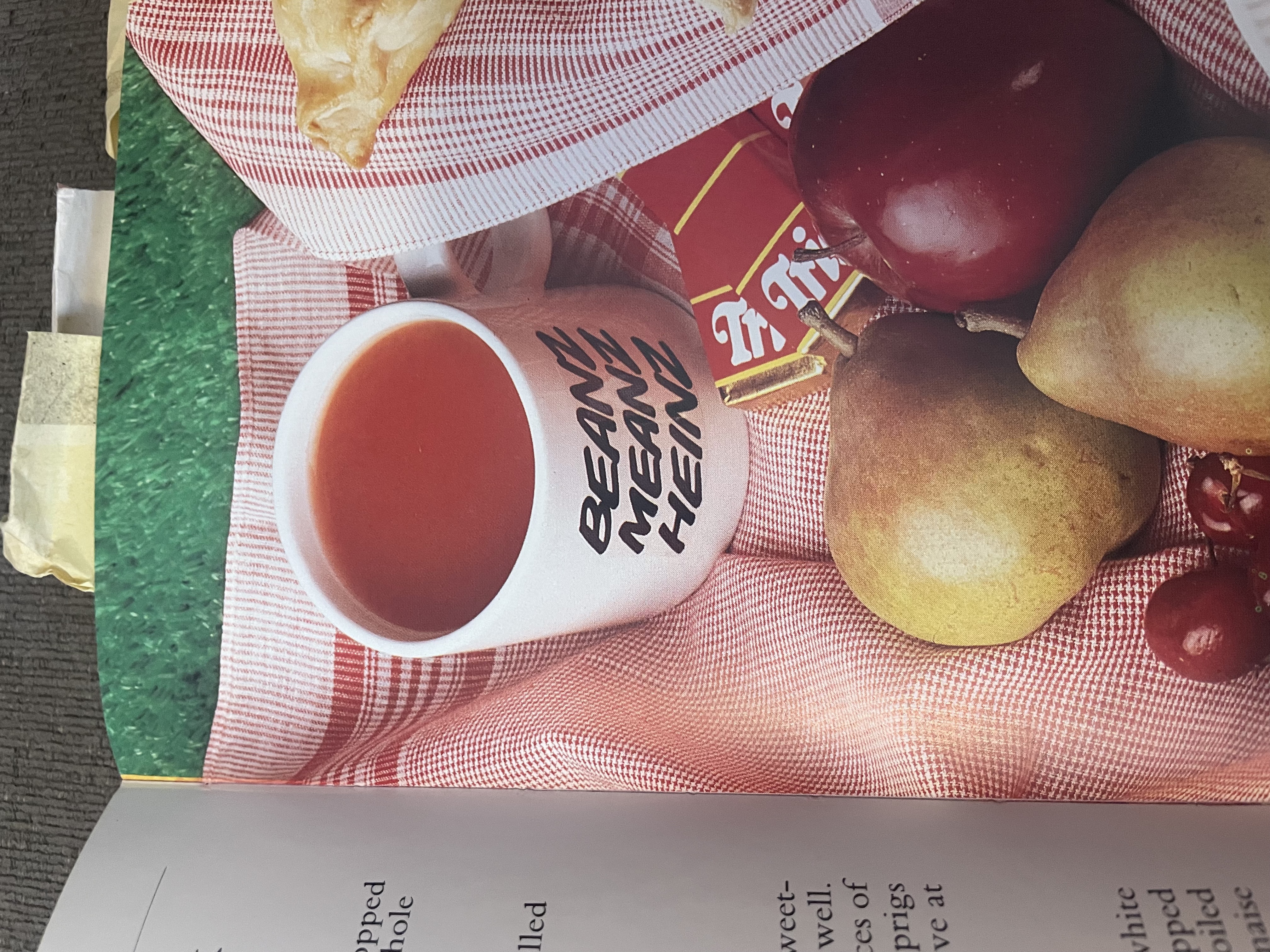 A white mug with the phrase Beanz Meanz Heinz on it